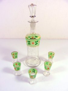 Antique port service with a decanter & five painted glass goblets decorated with flowers & beads.