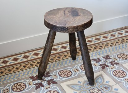 Antique dark wood tripod stool