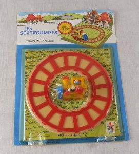 Vintage wind-up mechanical train, Smurfs, Ceji / Peyo, sealed, 1983
