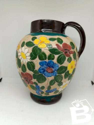 ancien vase a decor floral signé J massier en bon etat