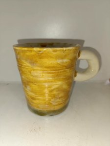 old vase/pot with handle signature to be determined in good condition