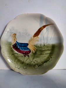 Old Choisy-le-Roi plate with pheasant decoration in good condition.