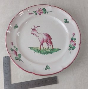 Old plate, goat decoration on terrace, Les Islettes / earthenware from the East