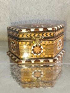 old hexagonal wooden jewelry box in good condition