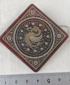 Vintage brooch, Feng Shui dragon, made of plastic.