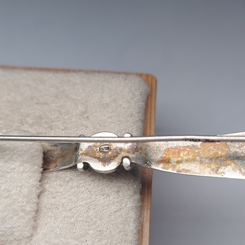 Ancienne broche, forme noeud, en argent, art deco