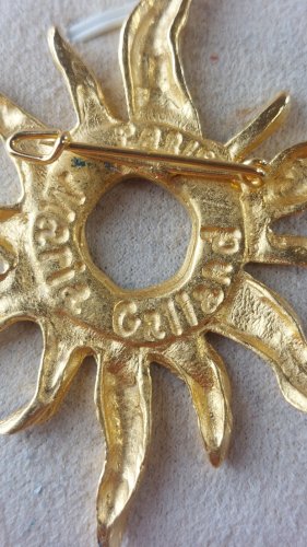 Ancienne broche soleil, en métal doré, Maria Galland Paris