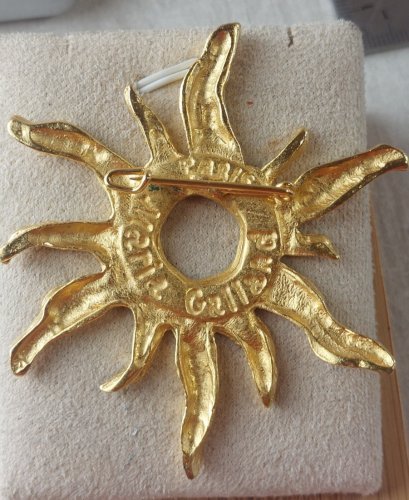 Ancienne broche soleil, en métal doré, Maria Galland Paris