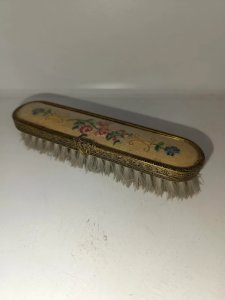 ancienne brosse a vetements decor floral en bon etat