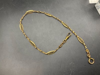 old pocket watch chain chatelaine. gold plaque.