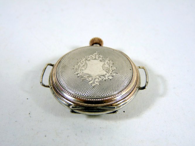 Ancienne montre à bracelet argent massif & or gravé & guilloché 10 rubis poinçon