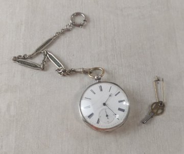 Antique pocket watch, cylinder escapement 4 jewels, with key and chain.
