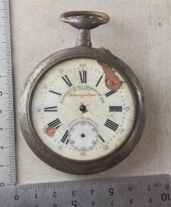 Old pocket watch regulator of the French railways