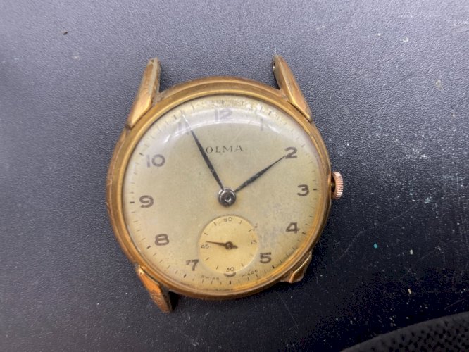 ANCIENNE MONTRE MÉCANIQUE OLMA .