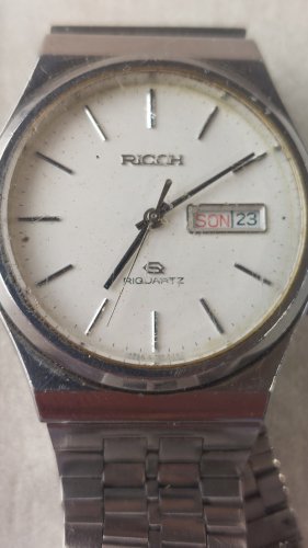 Ancienne montre Quartz, Ricoh ^