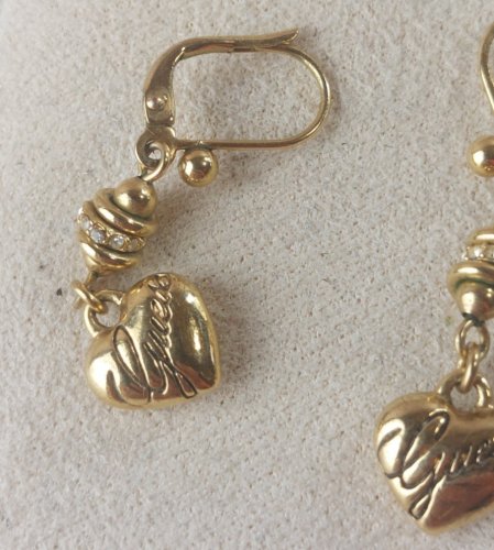Ancienne paire de boucles doreilles pendantes, en métal doré, Guess