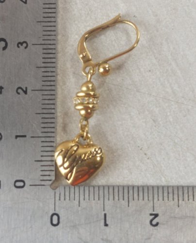 Ancienne paire de boucles doreilles pendantes, en métal doré, Guess