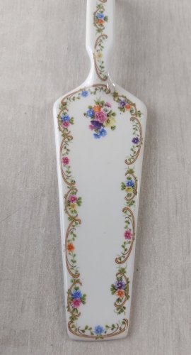 Ancienne pelle à tarte décor fleurs, en porcelaine, Décors de Paris