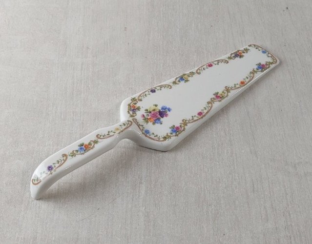 Ancienne pelle à tarte décor fleurs, en porcelaine, Décors de Paris