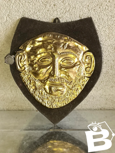 ancienne petit masque en bronze ou laiton funeraire du roi agamemmon en bon etat