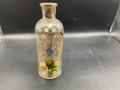 Old small bottle cross of the passion / Calvary