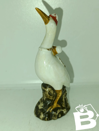 ancienne petite sculpture (asie) en forme de grue en bon etat