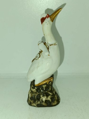 ancienne petite sculpture (asie) en forme de grue en bon etat