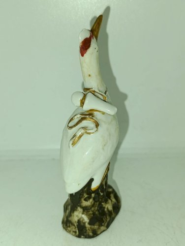 ancienne petite sculpture (asie) en forme de grue en bon etat