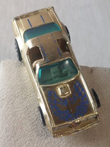 Old small car, Pontiac Hot Bird gold, Hot Wheels Mattel 1977