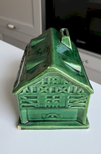 ancienne tirelire a casser en faience emaillee terre vernissee Saint Clement ?