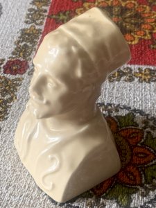 Old Orientalist faience piggy bank in the shape of a Zouave soldier.