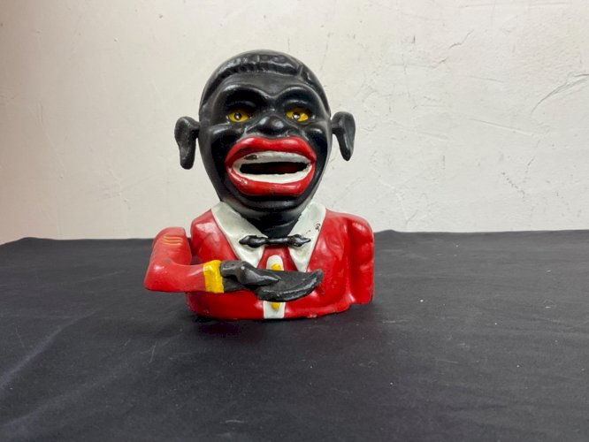 Ancienne Tirelire en fonte mètre d hôtel