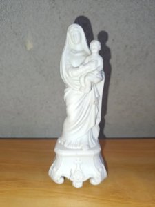 Old virgin with child in biscuit in good condition.