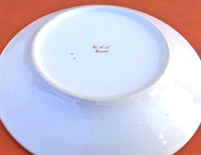 Années 1930 Assiette plate Porcelaine à décor floral   U.M.L (Union Marc Larchevêque)  