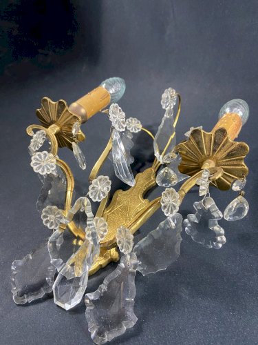 Applique à deux feux en bronze doré à décor de pampilles de cristal Louis XV