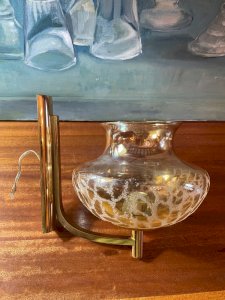 Vintage brass wall lamp with smoked glass.