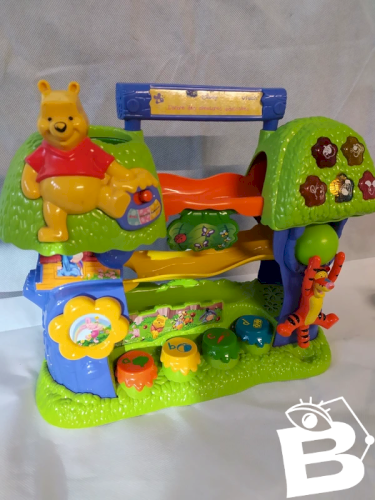 Arbre de jeux éducatifs Winnie lourson en bon état