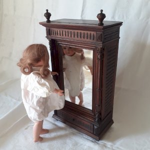 Antique doll cabinet, mirror, with detached columns.