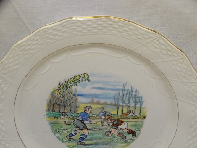 -ASSIETTE A DESSERT CERAMIQUE MOULIN DES LOUPS HAMAGE ANCIENNE MOIS FEVRIER    D