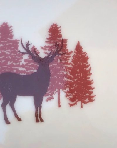 Assiette à dessert en porcelaine blanche et bordeaux au décor de Noël