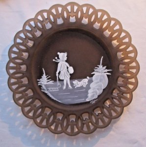 Art Deco decorative plate, brown opaline with cutouts, Little girl on the frozen pond.