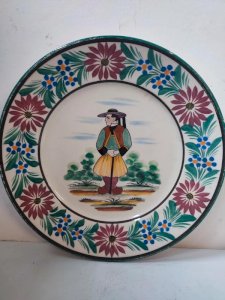 HB Quimper plate with a character design in good condition.