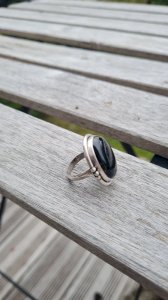 Silver and onyx cabochon ring