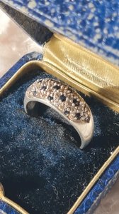 Silver ring with sapphire and zirconium