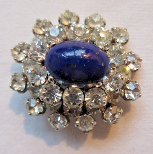 Bague femme, pierre bleue en dôme entourée de strass façon diamants