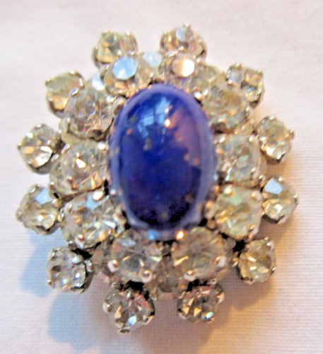 Bague femme, pierre bleue en dôme entourée de strass façon diamants