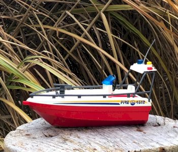 Red Playmobil boat