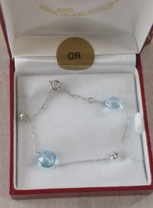 Beau bracelet en or blanc 375, topaze + zircon ^