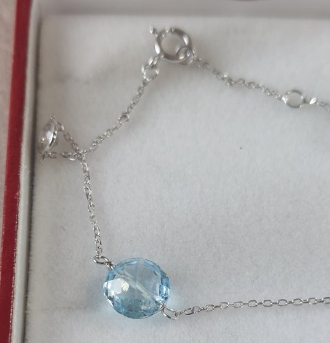 Beau bracelet en or blanc 375, topaze + zircon ^