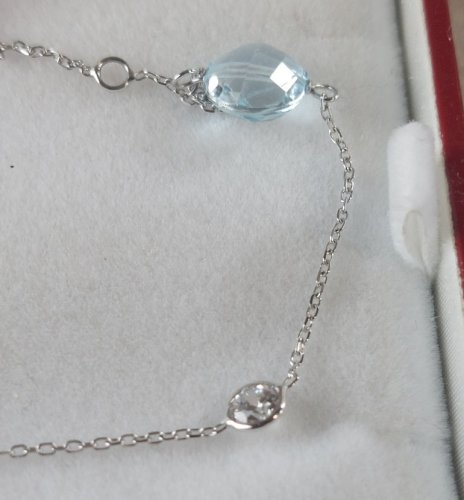 Beau bracelet en or blanc 375, topaze + zircon ^